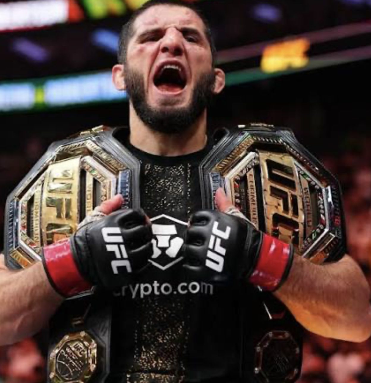 Islam Makhachev roars with his championship gold after a record-breaking win
